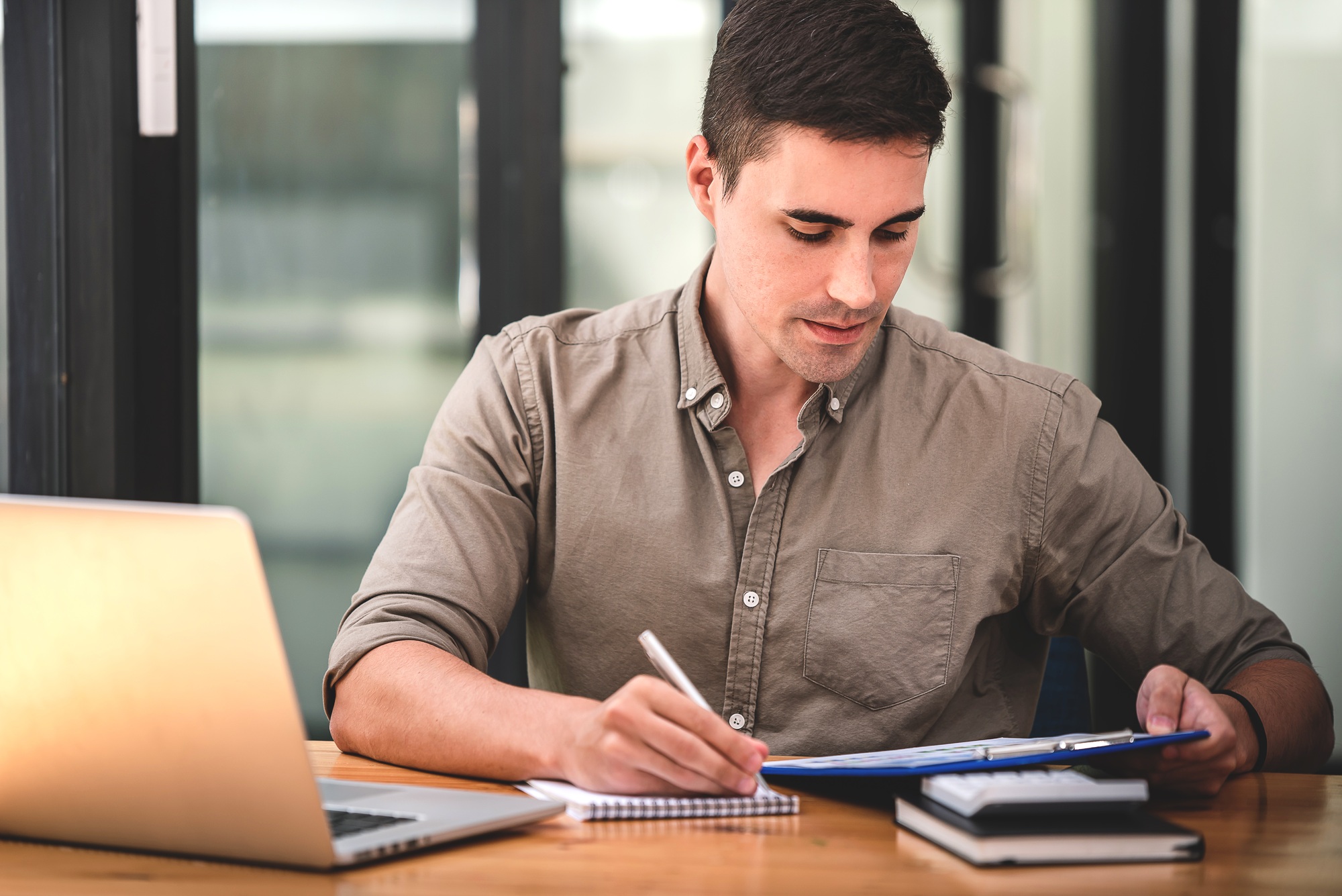 business man seriously analyzing business data, clear, hard work, busy, business bankruptcy, low pro